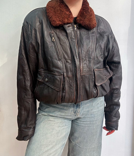 Leather bomber with furry collar