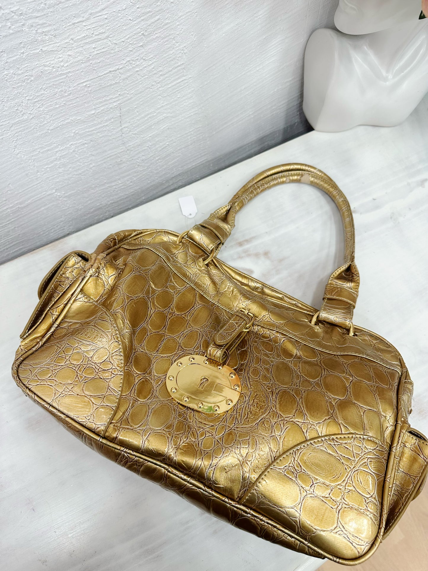 Big gold bag with padlock