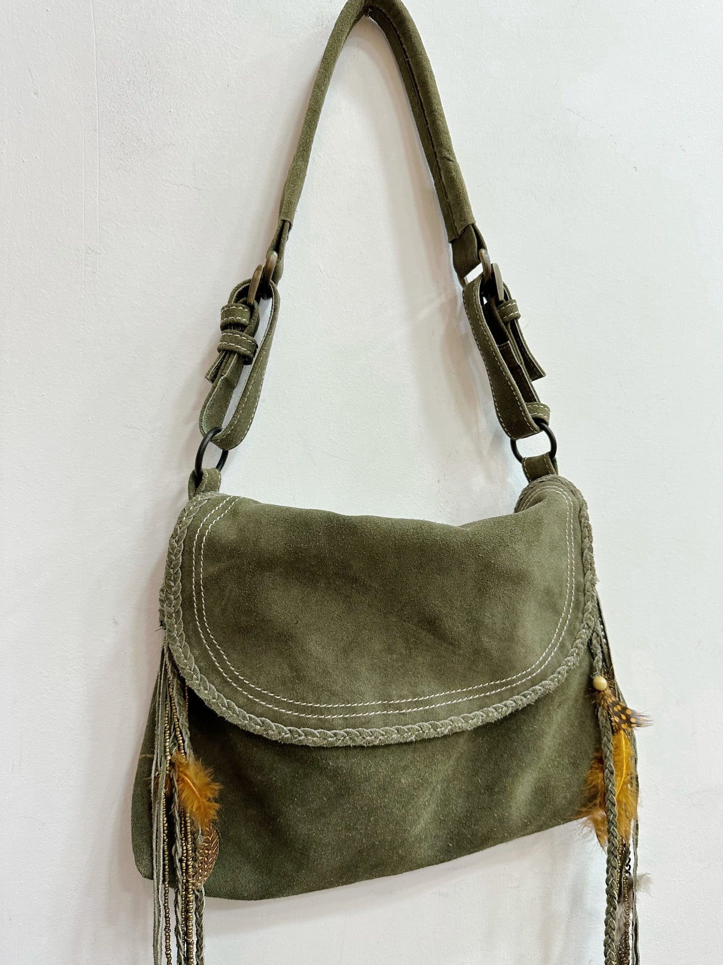 Leather shoulder bag with feather details