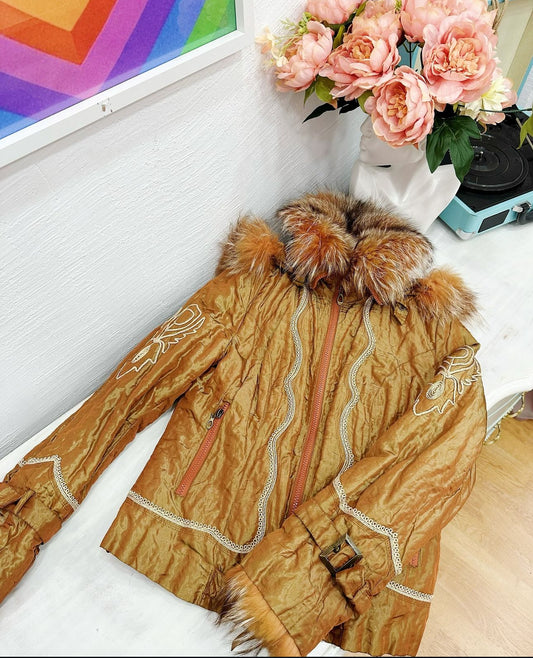 Warm metallic jacket with real fur details