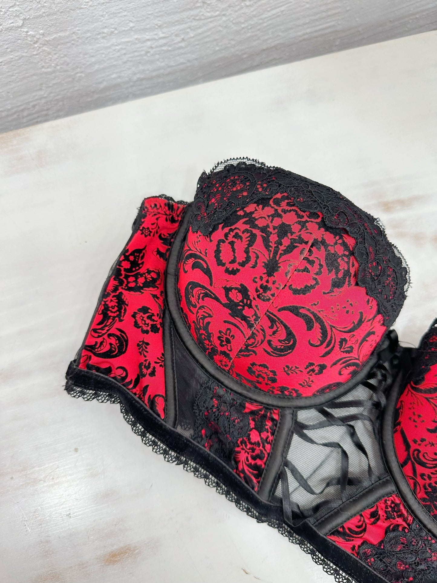 Red bustier with velvet details