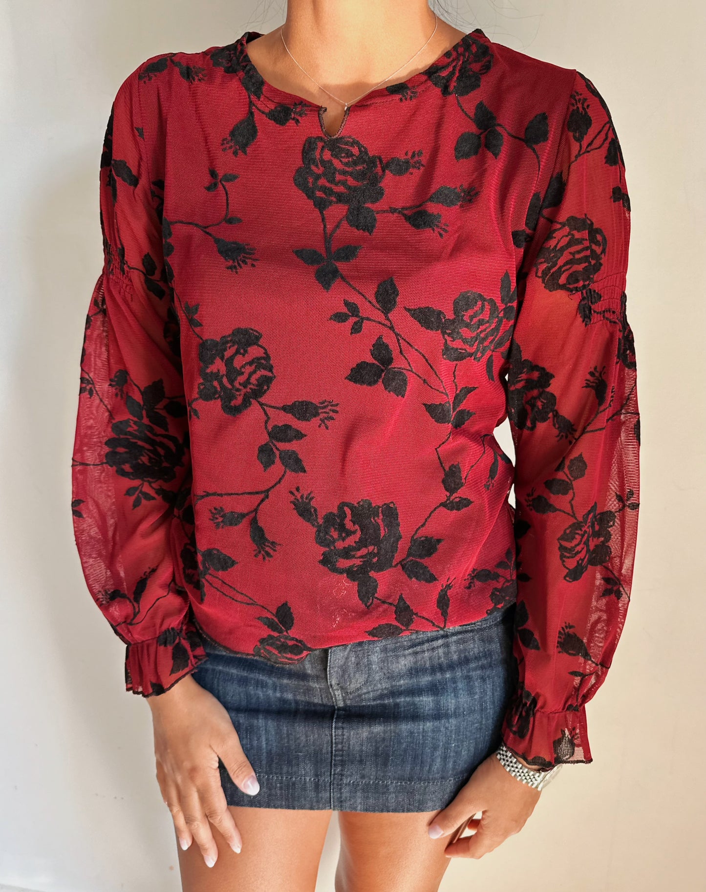 Red blouse with velvet flowers