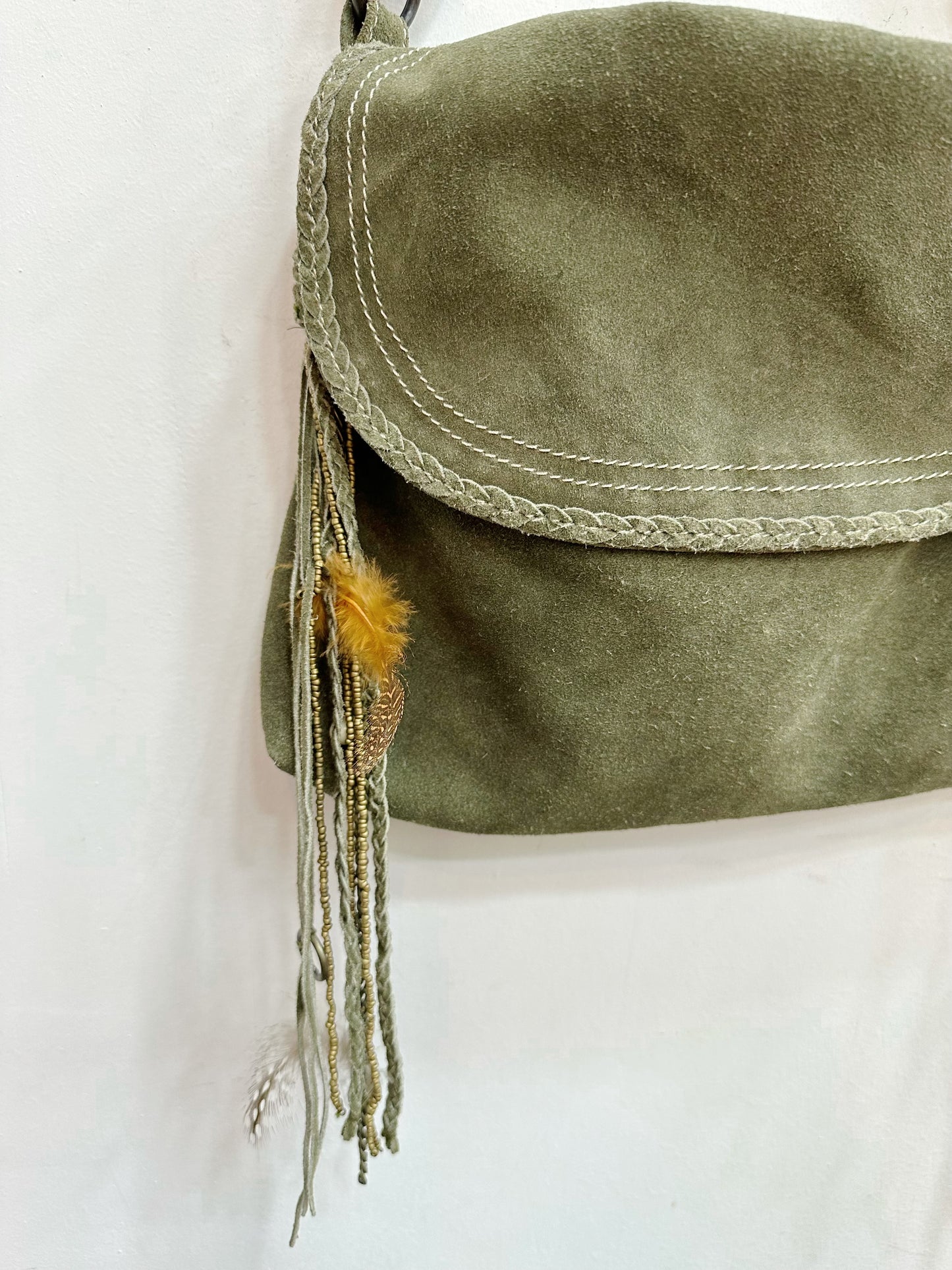 Leather shoulder bag with feather details