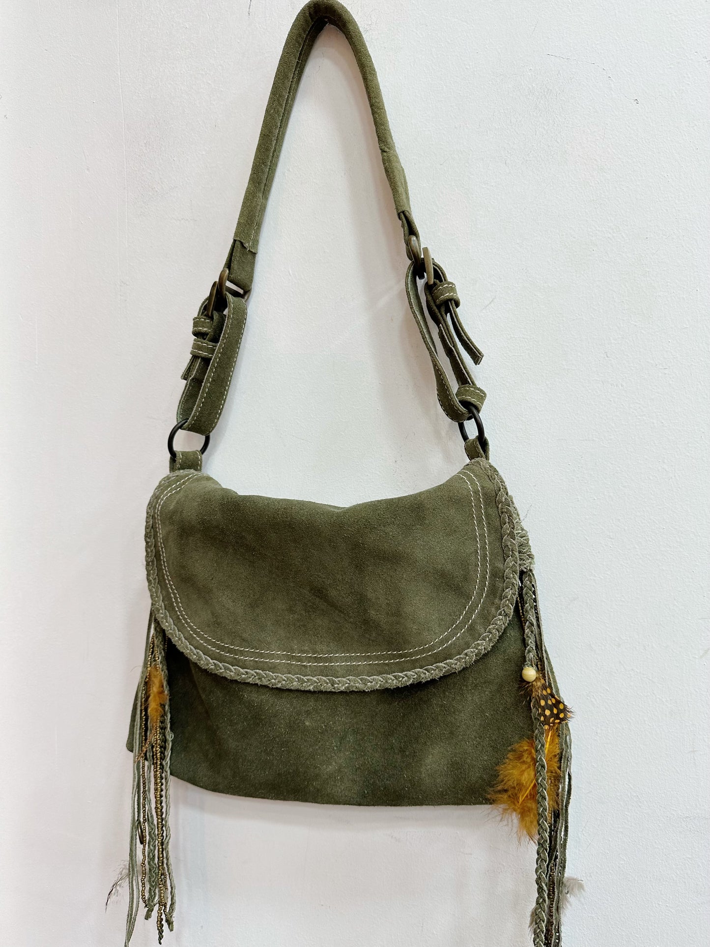 Leather shoulder bag with feather details