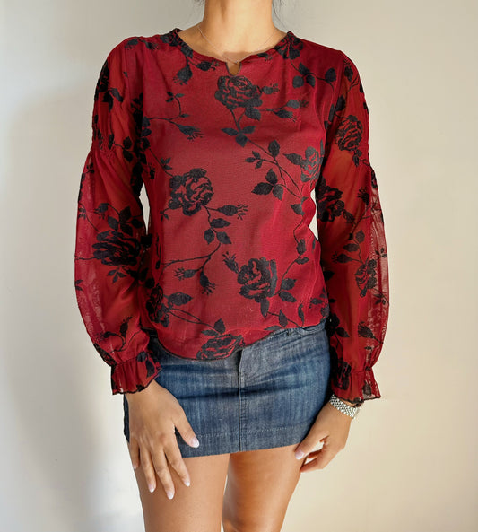 Red blouse with velvet flowers