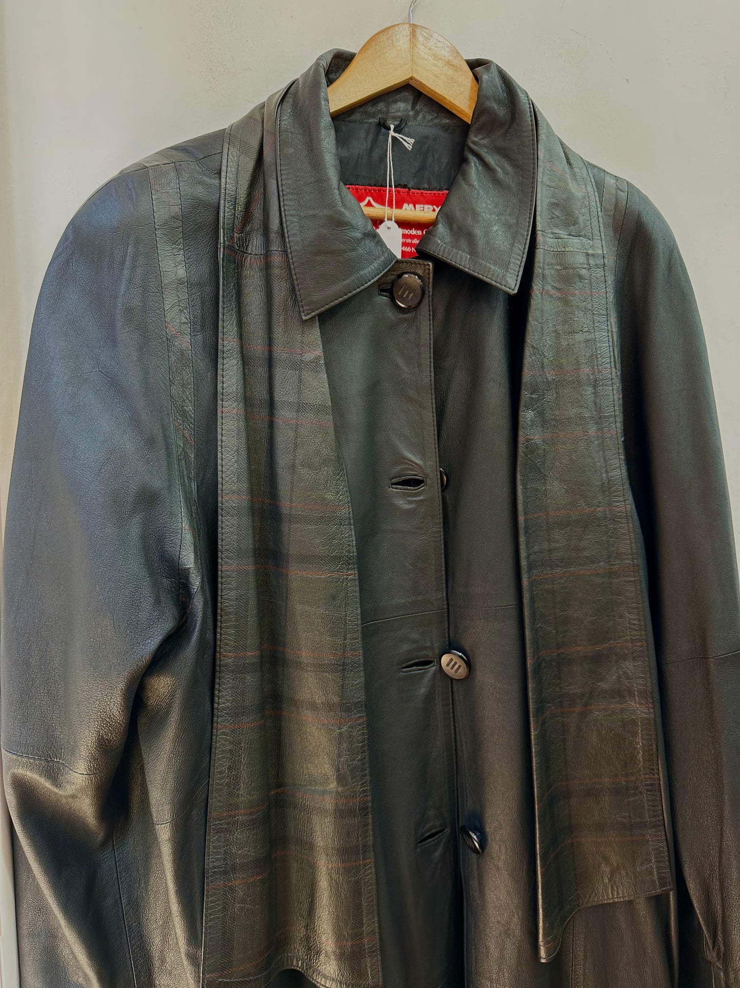 Leather coat with leather tartan scarf